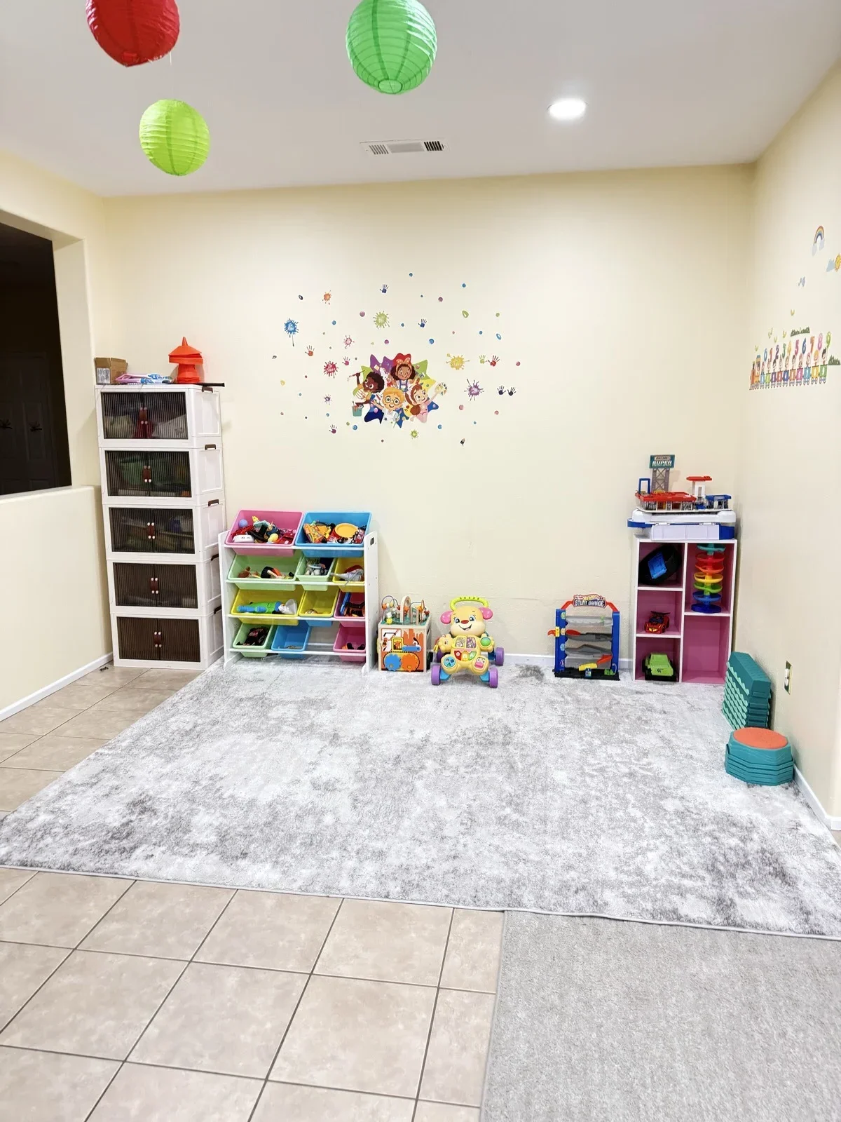 Colorful Indoor Play Area with Toy Shelves at Fairy Tale Child Care Palmdale