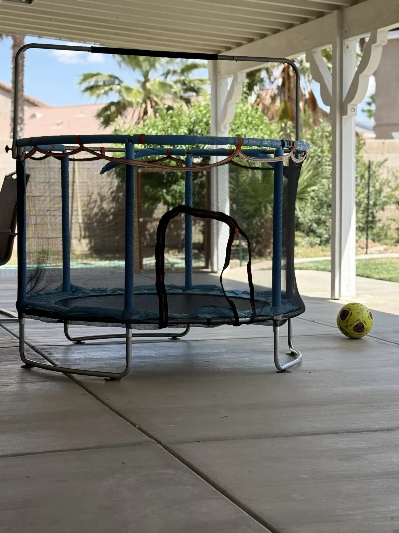 Outdoor Trampoline on Covered Patio at Fairy Tale Child Care Palmdale