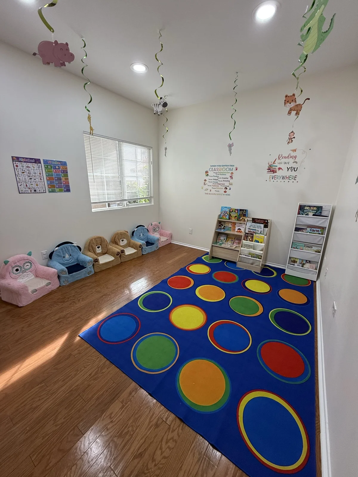 Preschool Children in Magical Reading Room with Colorful Rug and Books at Fairy Tale Child Care Palmdale